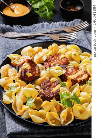 Shell Pasta And Meat Patties on a Plate 140341894
