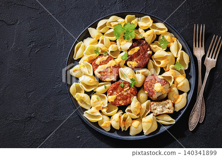 Shell Pasta And Meat Patties on a Plate Shell Pasta And Meat Patties on a Plate 140341899