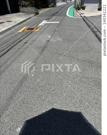 intersection on a narrow road intersection on a narrow road 140342221