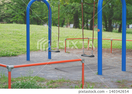 swing set in the park swing set in the park 140342654