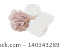 Beige washcloths and other accessories isolated on white background. Wash and cleaning. Care and hygiene. Top view. 140343289