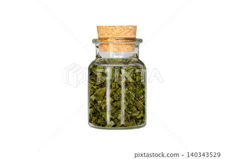 dried green onions in glass container isolated on white background dried green onions in glass container isolated on white background 140343529