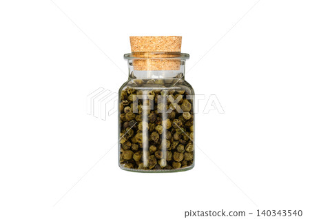 green pepper in glass container isolated on white background 140343540