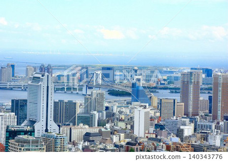 The Rainbow Bridge and the Waterfront Subcenter spanning Tokyo Bay. The Rainbow Bridge and the Waterfront Subcenter spanning Tokyo Bay. 140343776