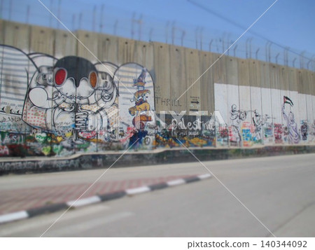 A diorama-style depiction of the border wall between Palestine and Israel. 140344092