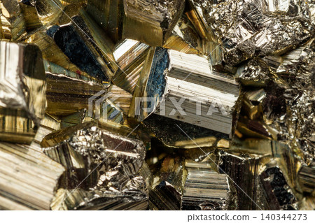 Macro mineral stone Pyrite on a black background Macro mineral stone Pyrite on a black background 140344273