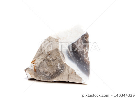 Macro mineral stone Flint in the rock on a white background 140344329