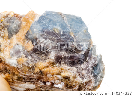 Macro mineral stone Corundum in rock a white background Macro mineral stone Corundum in rock a white background 140344338