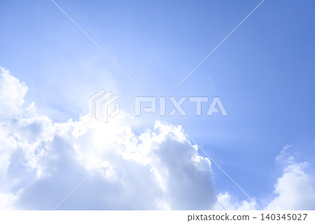 Summer sky background image of sunlight shining through gaps in cumulonimbus clouds - Yokohama Summer sky background image of sunlight shining through gaps in cumulonimbus clouds - Yokohama 140345027