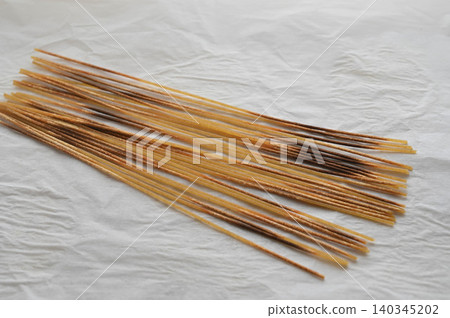 Whole wheat pasta noodles heated in a microwave Whole wheat pasta noodles heated in a microwave 140345202