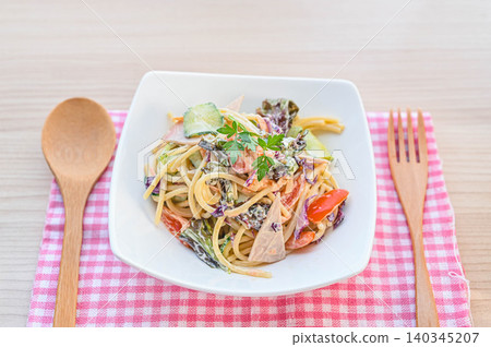 Spaghetti salad with lots of ingredients Spaghetti salad with lots of ingredients 140345207