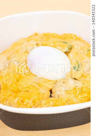 Delicious convenience store bento box: Oyakodon (chicken and egg rice bowl) 140345322