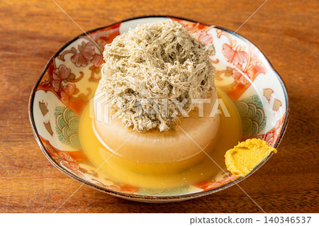 Oden daikon: A classic oden ingredient that has absorbed the broth. Oden daikon: A classic oden ingredient that has absorbed the broth. 140346537