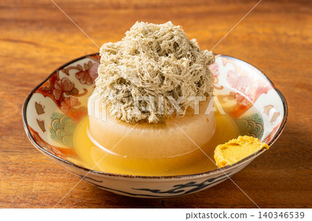 Oden daikon: A classic oden ingredient that has absorbed the broth. Oden daikon: A classic oden ingredient that has absorbed the broth. 140346539