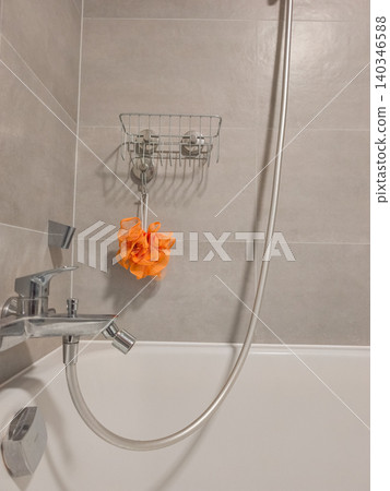 Bathtub faucet and shower hose with bath sponge Bathtub faucet and shower hose with bath sponge 140346588