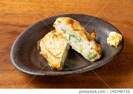 Oden Hiraten: Fish paste soaked in broth. Oden Hiraten: Fish paste soaked in broth. 140346738