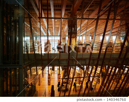 The bookshelves inside Toyama Library and the people using them. The bookshelves inside Toyama Library and the people using them. 140346768