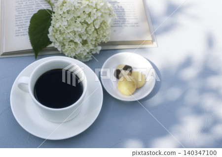 A peaceful reading time with Annabelle and coffee. A peaceful reading time with Annabelle and coffee. 140347100