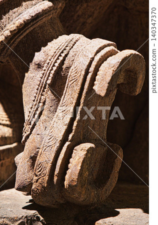 Close-up view on Statue Of Krishna Playing Flute. He Is God Of Protection, Compassion, Tenderness, And Love. Krishna Is Major Deity In Hinduism 140347370