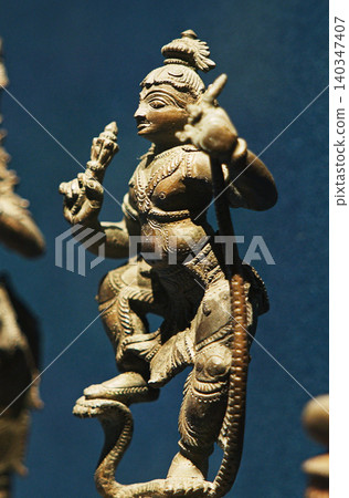 Old Ancient Bronze Figurines Of Indian Deities And Avatars. 18-19th Century Ce. Close-up View On Vamana Avatara. Old Ancient Bronze Figurines Of Indian Deities And Avatars. 18-19th Century Ce. Close-up View On Vamana Avatara. 140347407