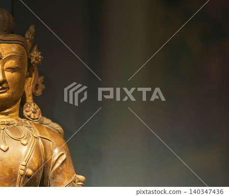 Gilt Bronze Statue of Vairocana . Close-up Detail of Vairocana Statue Gilt Bronze Statue of Vairocana . Close-up Detail of Vairocana Statue 140347436