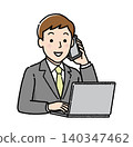 A businessman answering the phone while operating his laptop. 140347462
