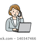 A businesswoman answering the phone while operating her laptop. 140347466