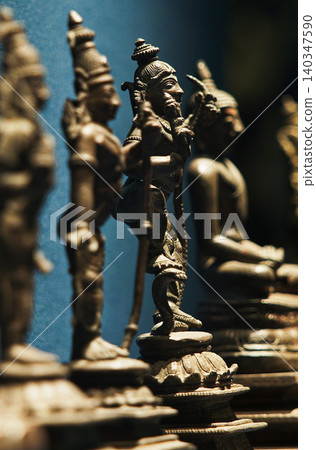 Old Ancient Bronze Figurines Of Indian Deities And Avatars. 18-19th Century Ce. Close-up View On Vamana Avatara. Old Ancient Bronze Figurines Of Indian Deities And Avatars. 18-19th Century Ce. Close-up View On Vamana Avatara. 140347590