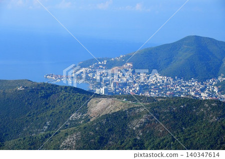 Montenegro, Pudva, view of Pudva in the distance, Adriatic Sea Montenegro, Pudva, view of Pudva in the distance, Adriatic Sea 140347614