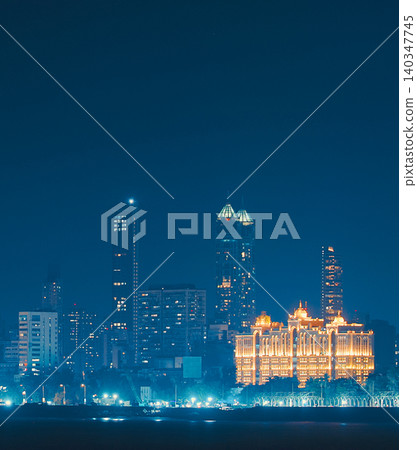 High-Rise Buildings in Mumbai at Night. Mumbai Skyline at Night Featuring Saifee Hospital High-Rise Buildings in Mumbai at Night. Mumbai Skyline at Night Featuring Saifee Hospital 140347745