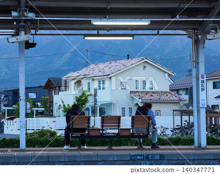 People waiting for a train on the platform at Hotaka Station in Nagano Prefecture. People waiting for a train on the platform at Hotaka Station in Nagano Prefecture. 140347771