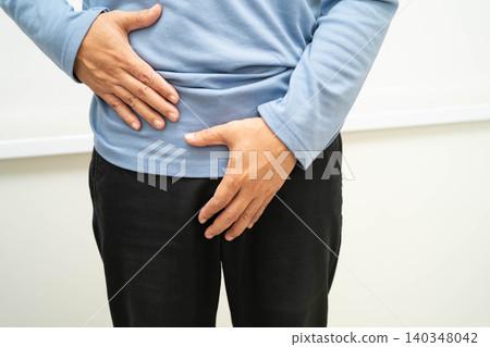 Hernia, Asian man stomach ache, abdominal pain and urology problem health. Hernia, Asian man stomach ache, abdominal pain and urology problem health. 140348042