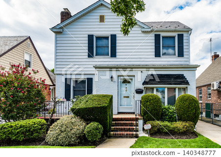 Private house in suburban area. Suburban house architecture. Suburb exterior with housing property. Suburban neighborhood. Private family home property. House exterior architecture. Suburban home Private house in suburban area. Suburban house architecture. Suburb exterior with housing property. Suburban neighborhood. Private family home property. House exterior architecture. Suburban home 140348777