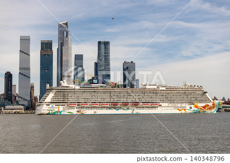New York, USA - March 31, 2024: Norwegian Getaway cruise ship voyage. Cruise liner at NY port. Norwegian cruise line. Cruise ship tour and travel at sea. Ship at cityscape of New York New York, USA - March 31, 2024: Norwegian Getaway cruise ship voyage. Cruise liner at NY port. Norwegian cruise line. Cruise ship tour and travel at sea. Ship at cityscape of New York 140348796