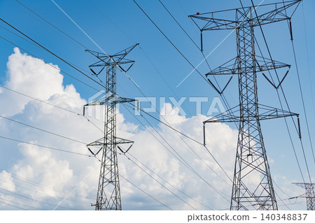 Green energy. Electric voltage station. High voltage. Electricity power pylon. Electricity tower. Electrical energy. Power transmission tower. Electricity power lines and sky. Energy supply pylon Green energy. Electric voltage station. High voltage. Electricity power pylon. Electricity tower. Electrical energy. Power transmission tower. Electricity power lines and sky. Energy supply pylon 140348837