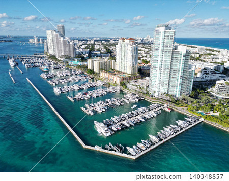 Private docks. South pointe Miami marina with luxury yacht. Summer vacation. Luxury South beach marina. Luxury yacht. Miami south beach top view. Yacht club. Marina in Miami, Florida Private docks. South pointe Miami marina with luxury yacht. Summer vacation. Luxury South beach marina. Luxury yacht. Miami south beach top view. Yacht club. Marina in Miami, Florida 140348857