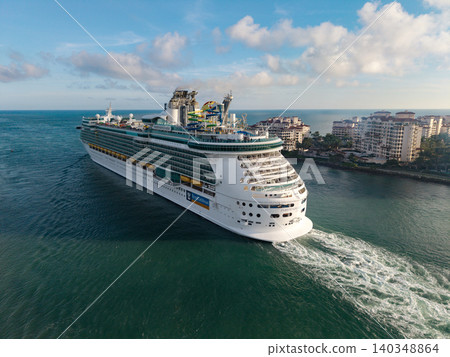 Miami, Florida, USA - February 03, 2025: Independence of the seas cruise ship voyage. Cruise in summer vacation. Royal Caribbean international. Cruise ship tour and travel at sea. Ship leaving port Miami, Florida, USA - February 03, 2025: Independence of the seas cruise ship voyage. Cruise in summer vacation. Royal Caribbean international. Cruise ship tour and travel at sea. Ship leaving port 140348864