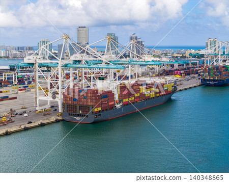 Miami, Florida - February 12, 2025: Port of Miami. Cargo ship loaded with container in Miami, aerial. Freight container. Aerial Miami port with cargo container. Export and import 140348865