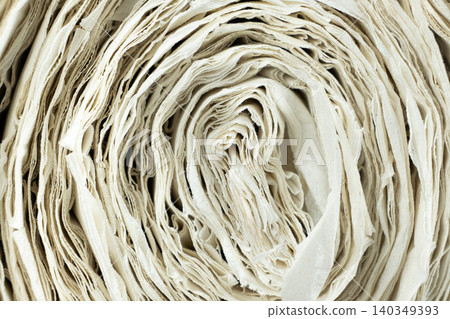 Macro texture of white recycled paper spiral Macro texture of white recycled paper spiral 140349393