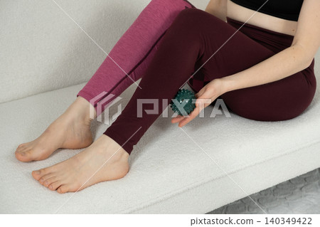 Self Myofascial Release Exercise with Massage Ball at Home Self Myofascial Release Exercise with Massage Ball at Home 140349422