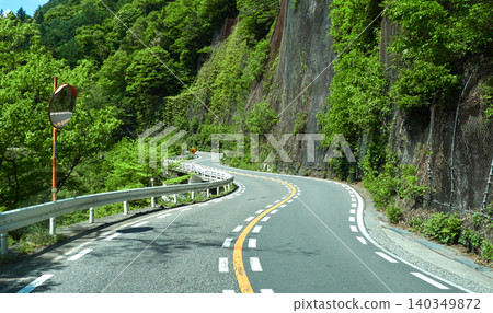 A rural road scene in Nagano Prefecture, Japan, in early summer. A rural road scene in Nagano Prefecture, Japan, in early summer. 140349872