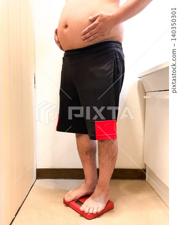 A middle-aged obese man who started dieting A middle-aged obese man who started dieting 140350301