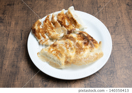 Freshly baked dumplings Freshly baked dumplings 140350413