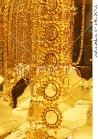 gold in jewelery shop window gold in jewelery shop window 140350416