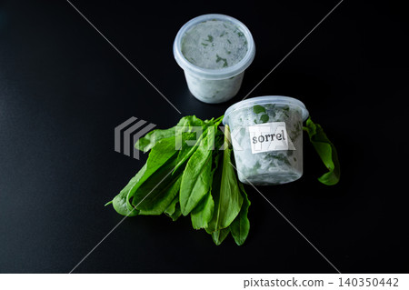 Healthy green sorrel bundle and fresh herbal leaves 140350442