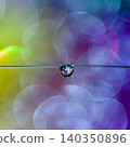 The beautiful gradient background and hanging water droplets create a fantastical atmosphere. 140350896