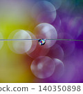 The beautiful gradient background and hanging water droplets create a fantastical atmosphere. 140350898