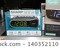 SHARP Digital Alarm Clock in a box on a shelf closeup 140352110