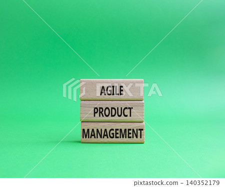 Agile Project Management symbol. Concept word Agile Project Management on wooden blocks. Beautiful green background. Business and Agile Project Management. Copy space 140352179