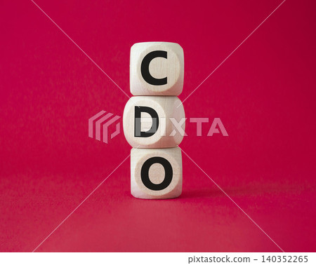 CDO - Collateralized Debt Obligation symbol. Wooden cubes with word CDO. Beautiful red background. Business and Collateralized Debt Obligation concept. Copy space. CDO - Collateralized Debt Obligation symbol. Wooden cubes with word CDO. Beautiful red background. Business and Collateralized Debt Obligation concept. Copy space. 140352265